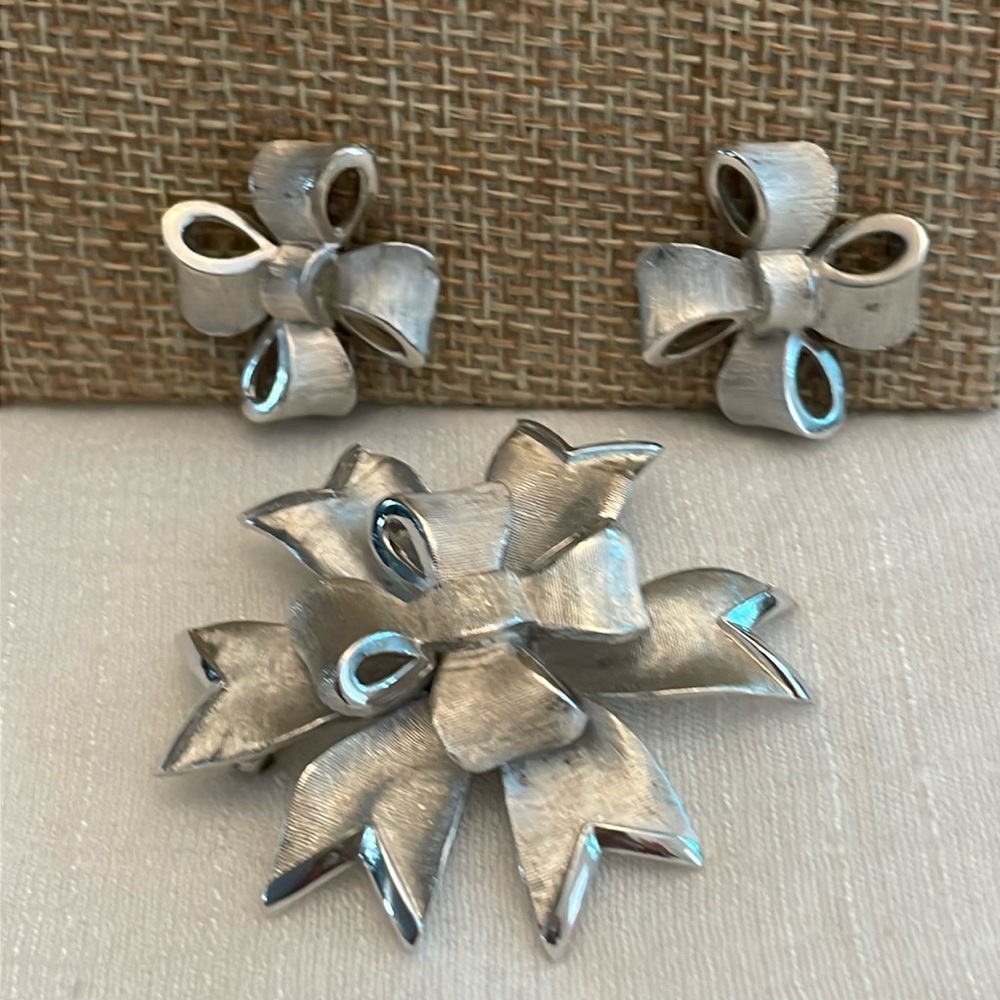 Vintage Trifari signed satin ribbon bow and signed matching clip on earrings set
